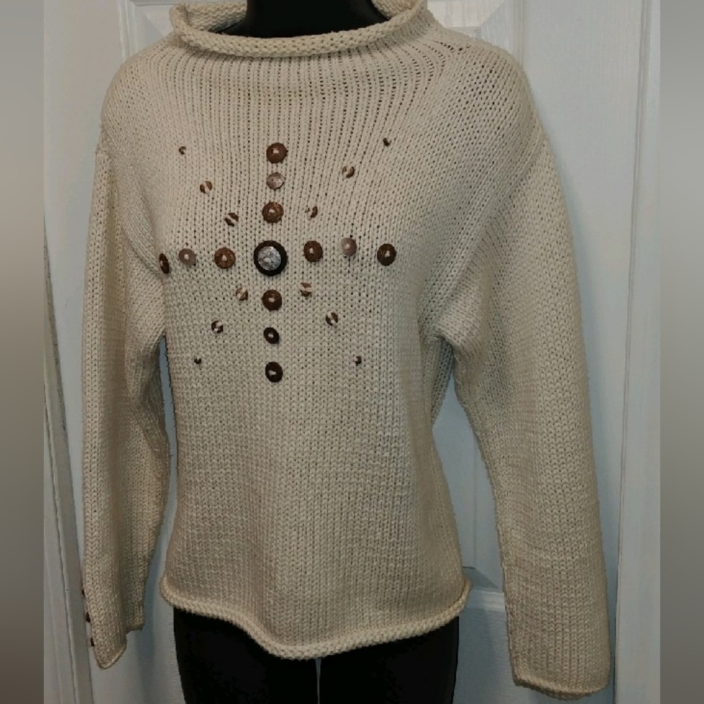 Pure Handknit mockneck sweater.